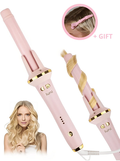 Pink hair curler with gold accents on a white background